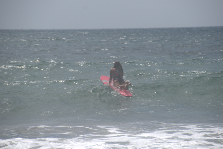 Paddling over a wave