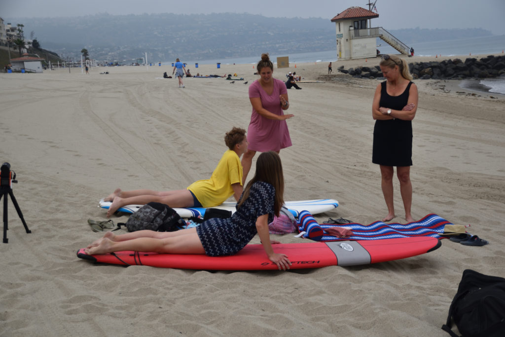 Learn to surf faster by practicing on the beach. 